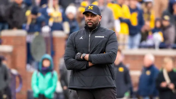 Former Michigan Football Coach Sherrone Moore Faces Charges of Stalking and Home Invasion